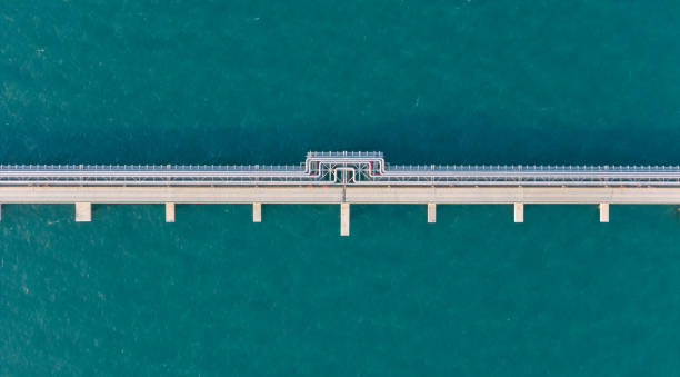 istock LPG,oil refinery, Logistics and transportation with working crane bridge in harbor 2015067786