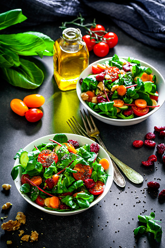 Healthy eating. High angle view of two fresh salad bowls