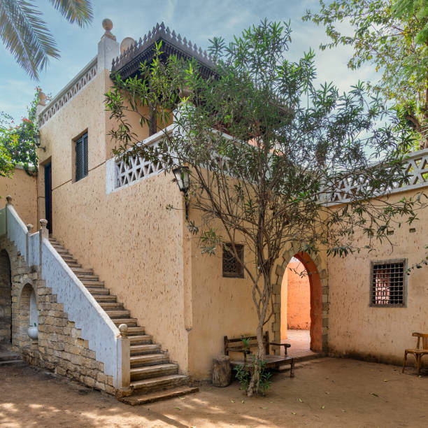 istock Tranquil courtyard showcasing traditional building style and flora, inviting a sense of serenity and historical charm 2015086044