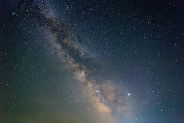 istock starry sky with milky way, night starry sky background 2015101914