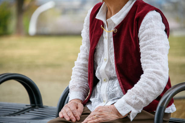 senior woman sitting on a bench