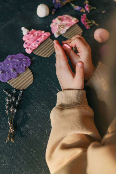 istock A child sculpts from plasticine, an idea for an activity 2015183320
