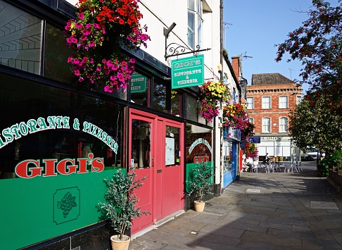 Gigis Italian restaurant along Magdalene Street, Glastonbury, Somerset, UK, Europe.