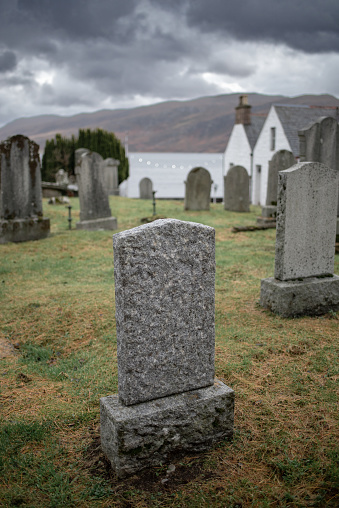 Old Mill Street burial ground in Ullapool, a historic Scottish fishing village, with Commonwealth graves.