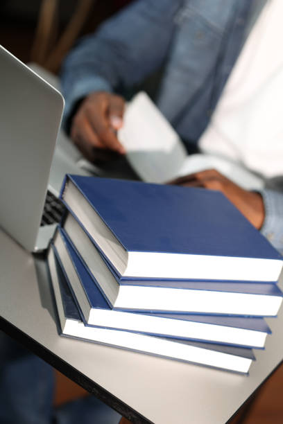 istock Male businessman in modern office at desk with laptop 2015257521