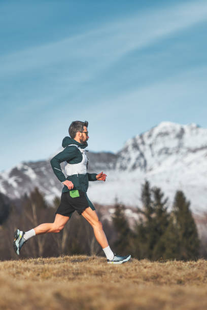 istock Man ultramarathon runner in the mountains 2015258595