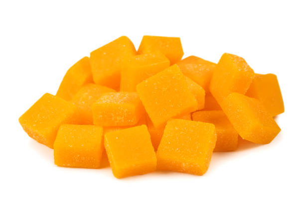 istock view of candied mango dices isolated on white 2015279960