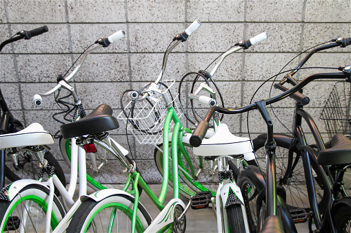 Row of beach cruiser rental bicycles for National Bike Month in May