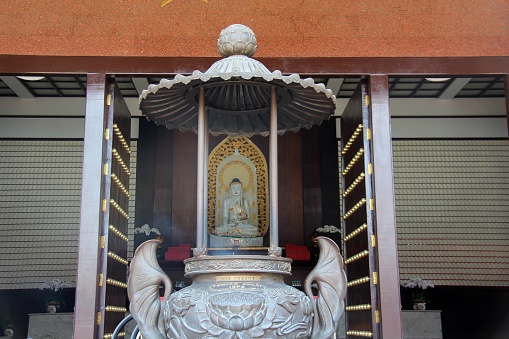 Zu Lai Temple, view of the altar through the censer in Cotia, SP, Brazil.
