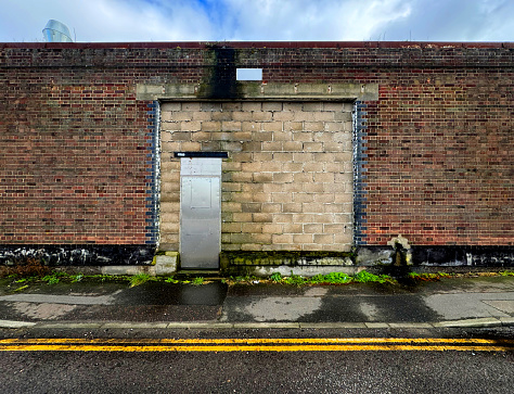Bricked up doorway on an old industrial building in Great Yarmouth