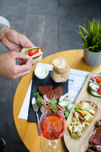 istock Person Eating at an Outdoor Brunch 2015367773