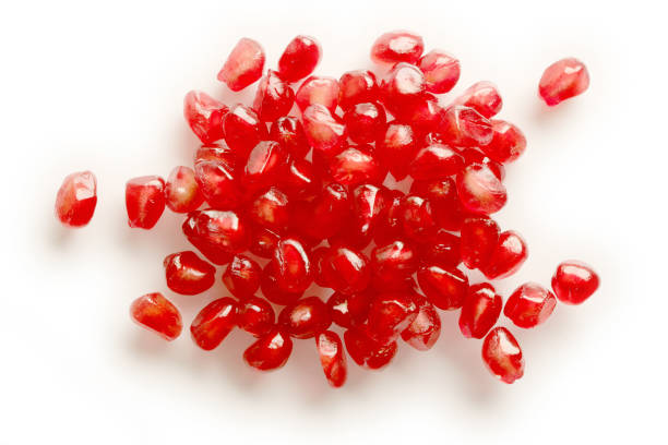 istock Pomegranate Seeds on Glass over white Background 2015371992