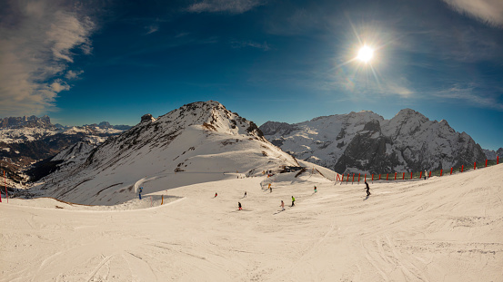 View of a ski slopes around Sela mountain, Selaronda, Dolomites, Italy