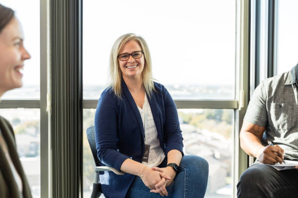 istock Mature female supervisor smiles for the camera 2015414468
