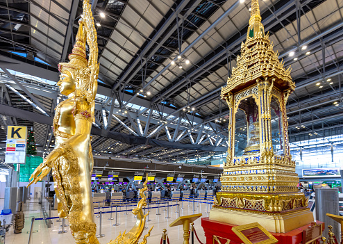 Thailand, Bangkok, 27 January, 2024: Bangkok Suvarnabhumi International Airport terminal with planes departing to multiple international locations