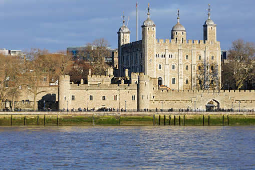 Daytime view of the Tower of London on the river Thames (England).