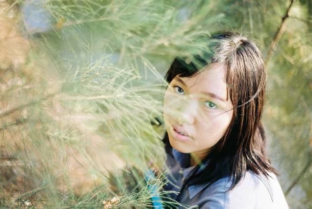 asian woman in nature