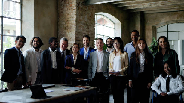 istock Multiracial group of business people smiling on camera inside office. Generational team, entrepreneur concept 2015466774