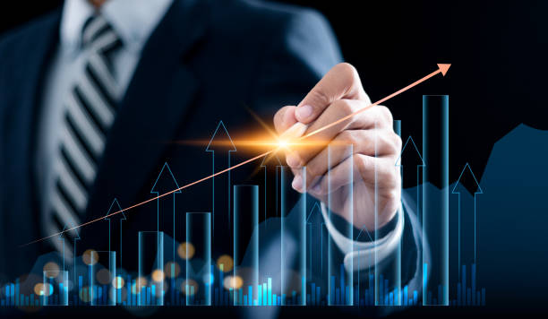 istock Business growth concept. Businessman touching analyzing economic growth graph and financial data, global economic trend analysis, planning business strategy, digital marketing. 2015478821