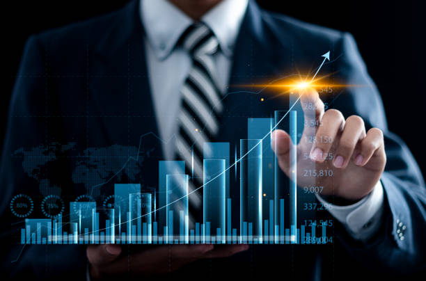 istock Business growth concept. Businessman touching analyzing economic growth graph and financial data, global economic trend analysis, planning business strategy, digital marketing. 2015485241