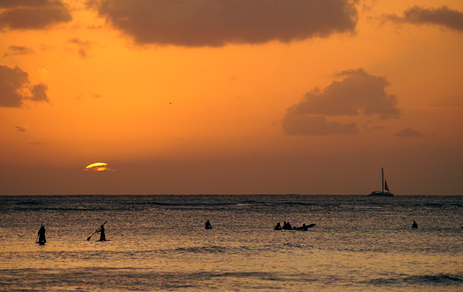 Sunset at Waikiki beach, Honolulu, Island of Oahu, Hawaii - United States