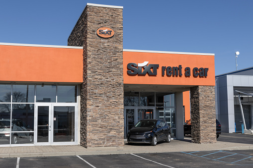 Indianapolis - February 11, 2024: SIXT Rent a Car location. SIXT offers a range of rental cars at a variety of price points.