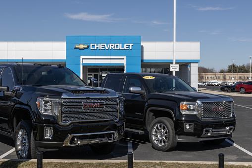 Indianapolis - February 11, 2024: Used pickup truck display at a Chevrolet dealership. With supply issues, Chevy is selling pre-owned trucks to meet demand.