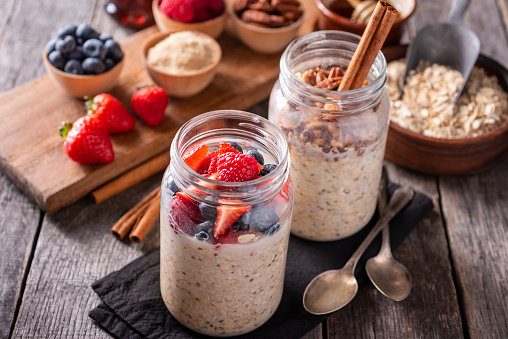 Jars of Overnight Oats with Fresh Fruit and Toppings