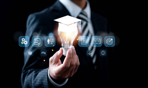 istock online education concept, Businessman holding light bulb with E-learning education icons for internet lessons and online webinar. study knowledge, creative thinking idea, education internet technology 2015538221