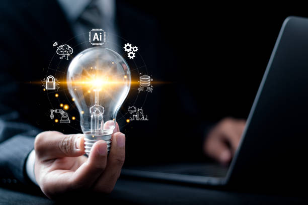 istock AI technology concept. Businessman holding light bulb with AI tools for big data network connection, AI learning, science and artificial intelligence technology, innovation for futuristic. 2015542548