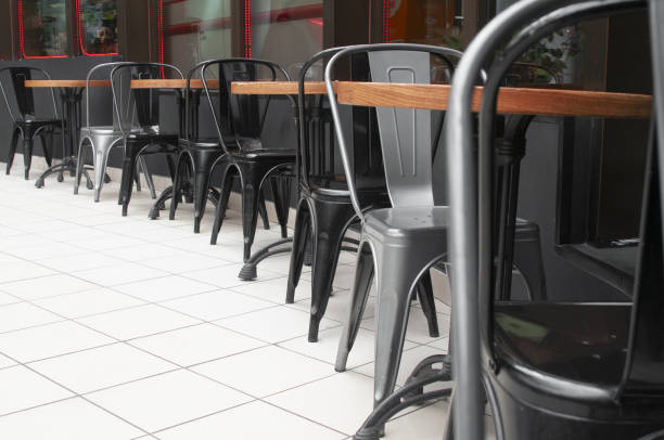 istock Interior cafe with plastic chairs and round tables 2015591456
