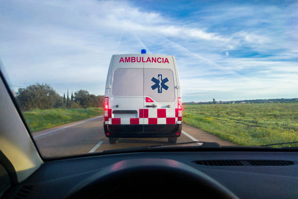istock Driving behind an ambulance on local road 2015618940