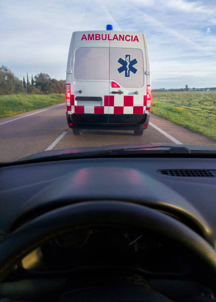 istock Driving behind an ambulance on local road 2015618950