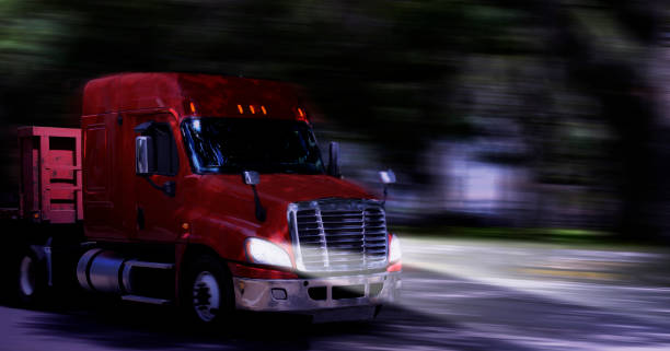 Truck travelling in the night on highway