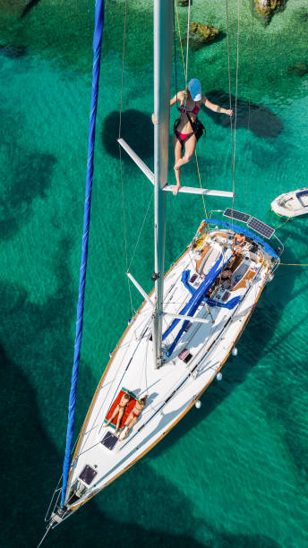 istock Group of young people enjoying vacation on sailboat 2015652017