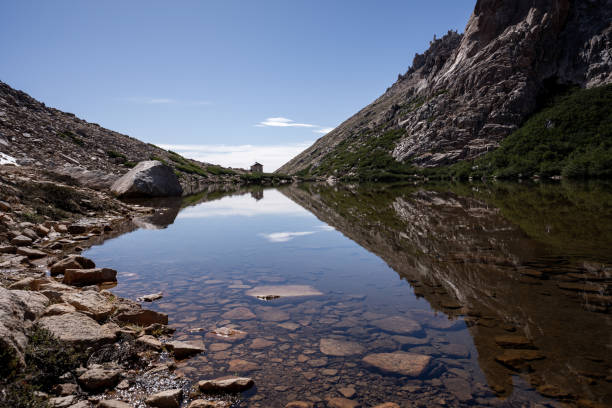 The reflection lake Toncek from the top of the Refugio Frey during summer