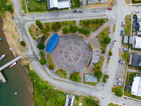 Aerial view of the central town square of Puyuhuapi in Chile during the summer