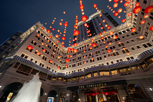 Hong Kong - February 16, 2024 : Chinese New Year red lanterns decorated at the Peninsula Hong Kong in Tsim Sha Tsui, Hong Kong.