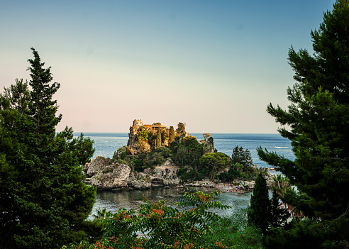 The islet of Isolabella, at the foot of the splendid Taormina, photographed at sunset