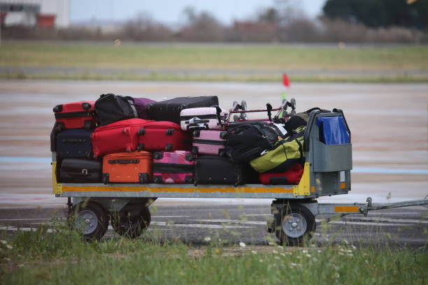 istock Trolley with luggage in an airport 2015698499
