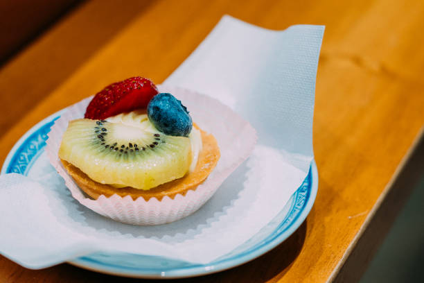 fruit tartlet, Homemade fresh fruit tart with kiwi and strawberries on white background