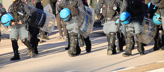 Vicenza, VI, Italy - January 20, 2024: Italian police in riot gear during the protest demonstration with helmets