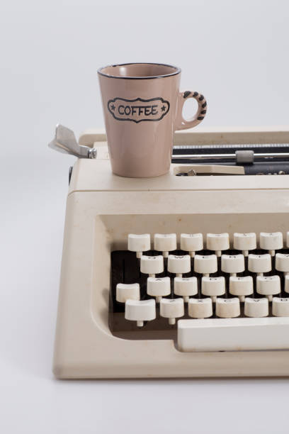 coffee and typewriter stock photo