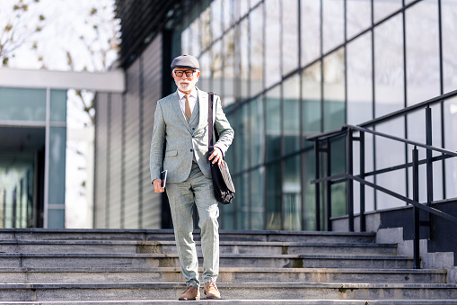 Portrait of senior businessman outdoors