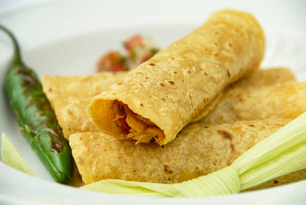 istock Mexican tacos, fish taco in a corn tortilla 2015905702