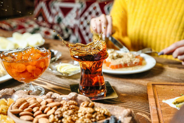 Wooden Table Adorned With Plates of Delicious Food