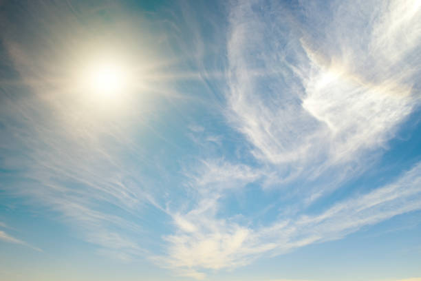 istock Bright sun on blue sky and cirrus clouds. 2015931677