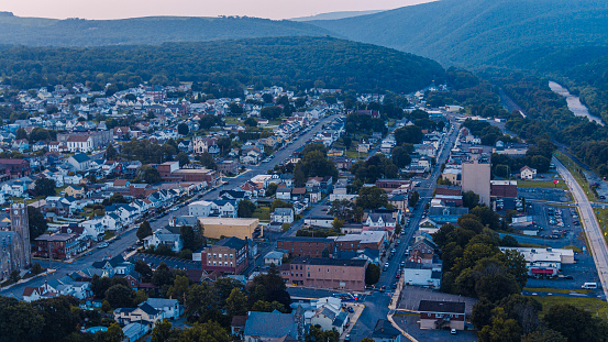 Sunset on a small neighborhood in mountains.  Houses line the streets of Lehighton in Pocono Mountain Region in Pennsylvania