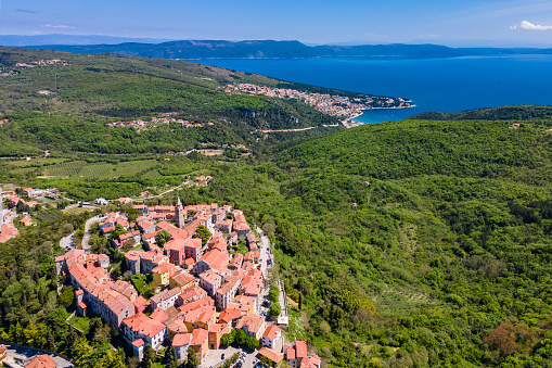 An Aerial shot of the picturesque Croatian village Labin featuring the town of Rabac