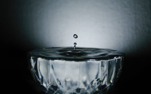 istock Perfectly Caught Water Drop or Sprinkle , dropping in bowl loaded with water. 2015996480